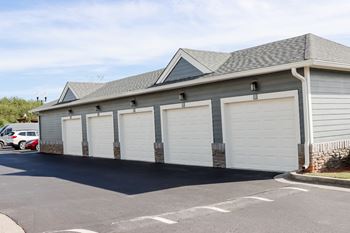 A building with four white garage doors